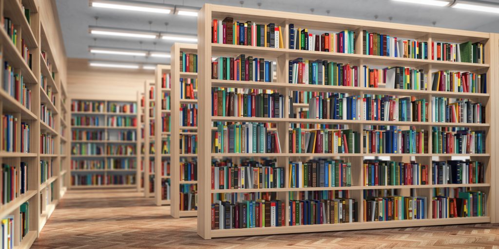 Library. Bookshelves with books and textbooks. Learning and education concept.